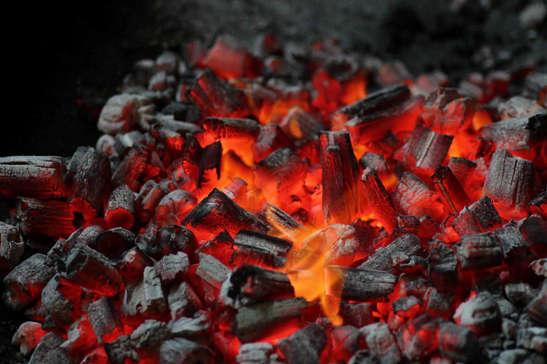 Burning charcoal coals ready for heating and cooking